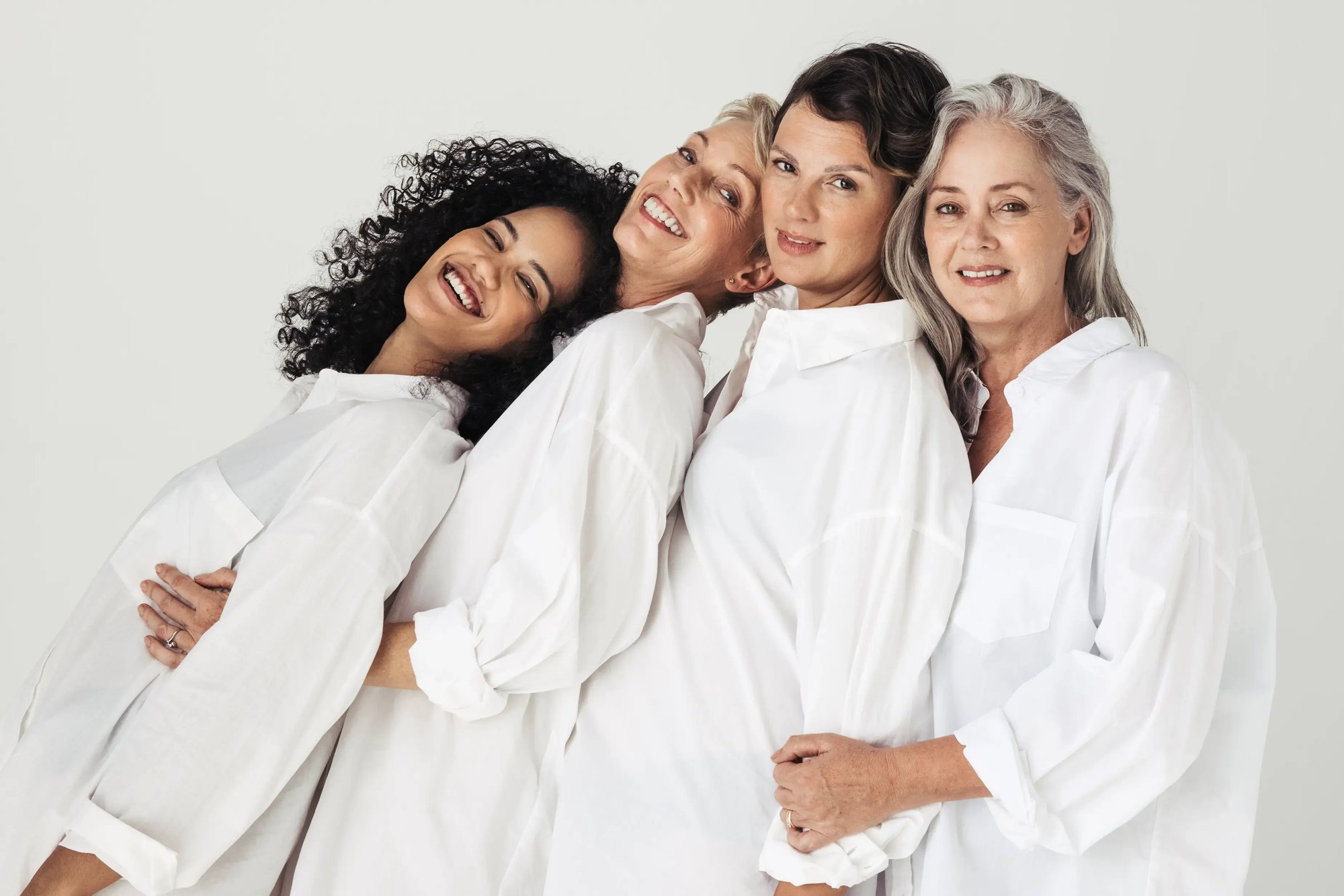 women-health_diverse-different-ages-wearing-white-cropped